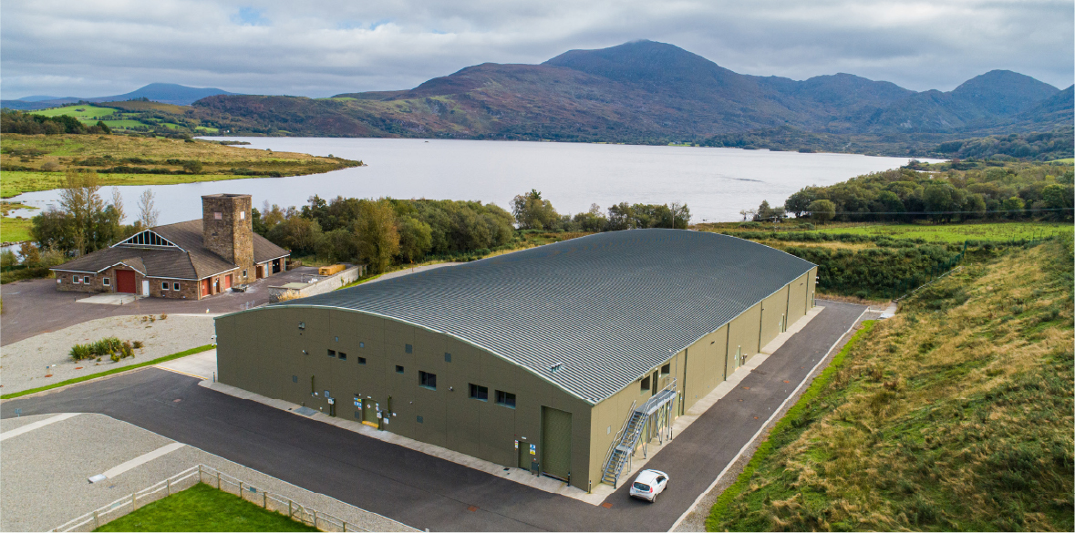 Wastewater treatment plant at edge of lake.