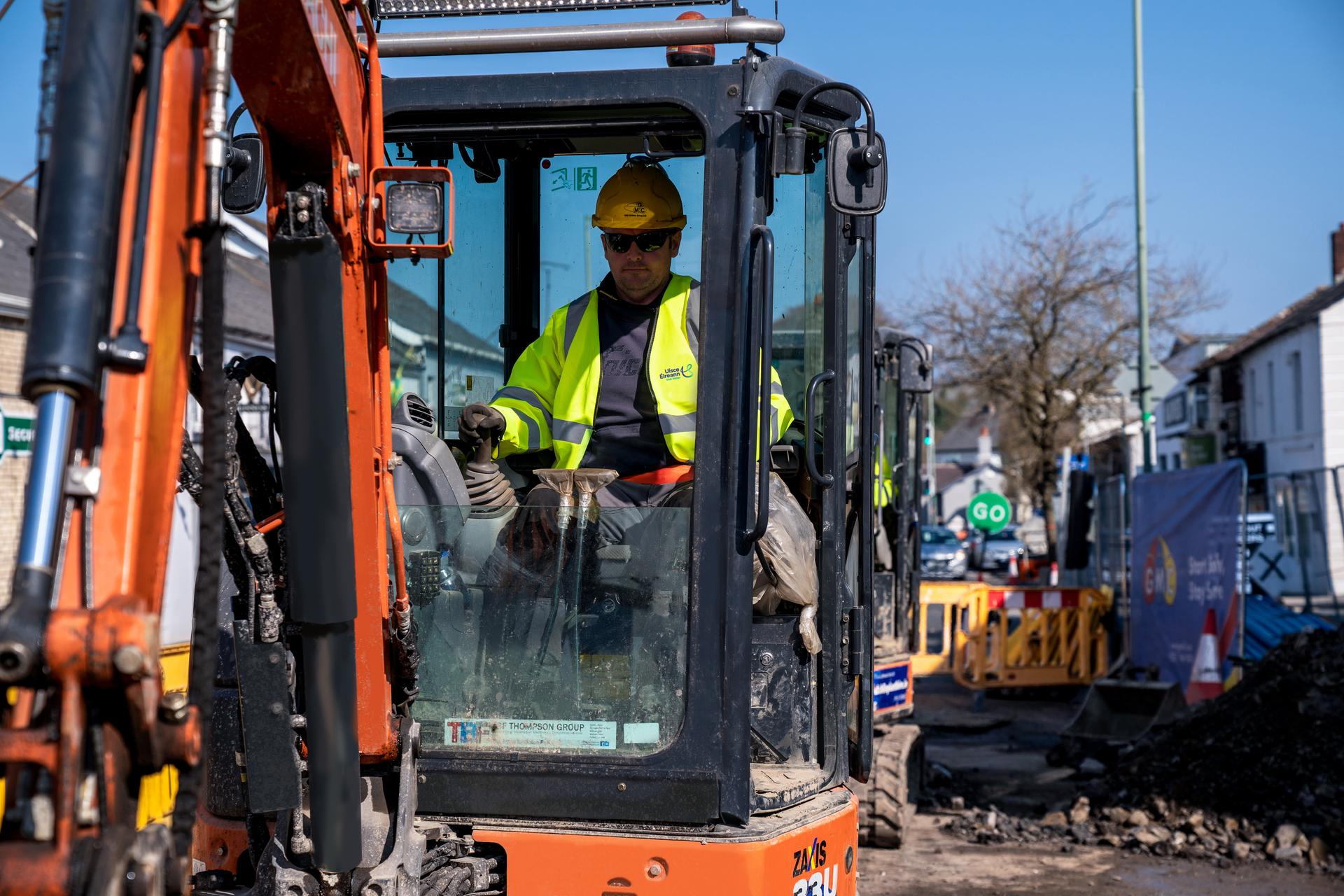 Uisce Éireann worker using a digger