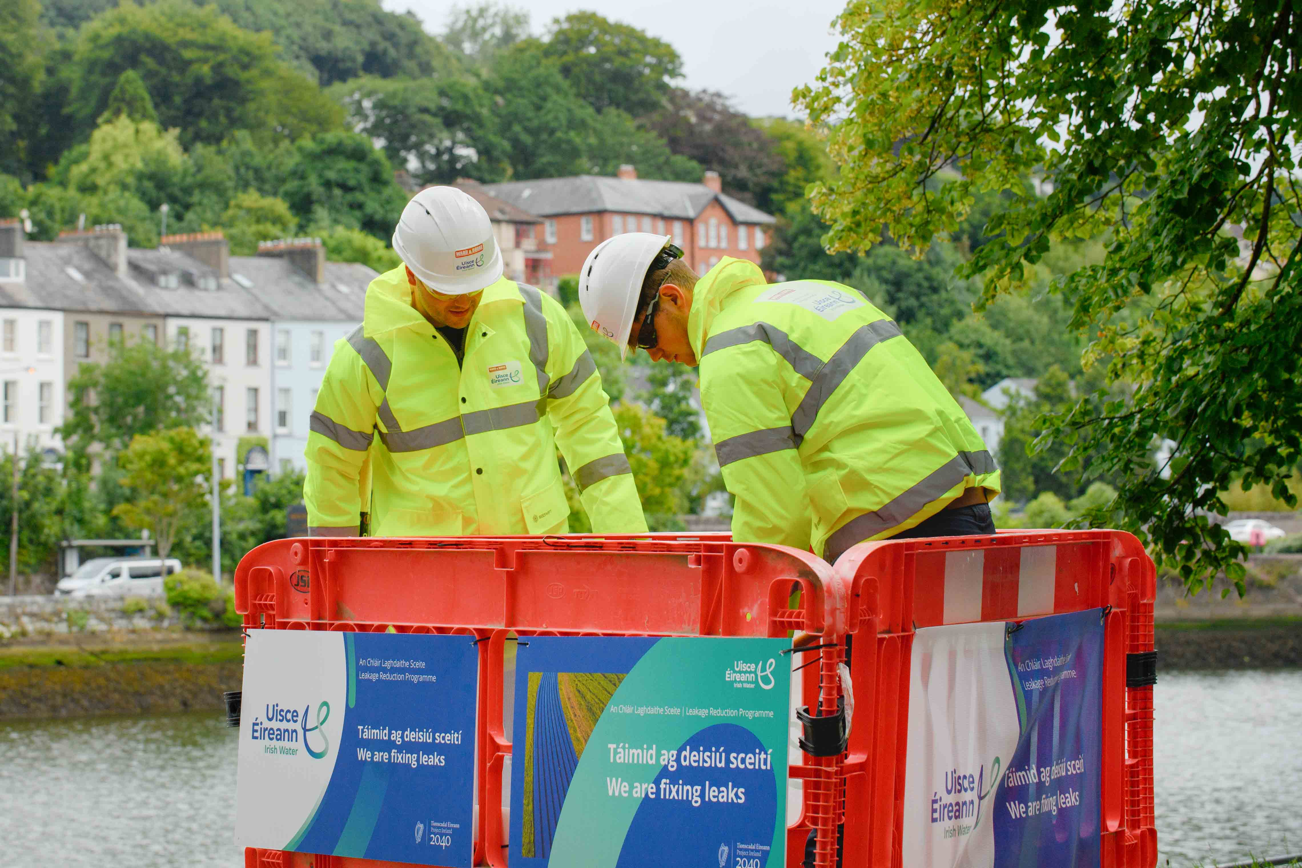 Two Uisce Éireann employees working at the Cork Marina