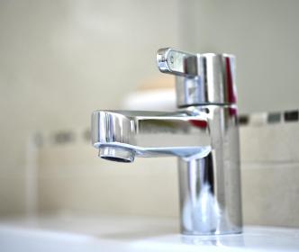 A silver bathroom tap